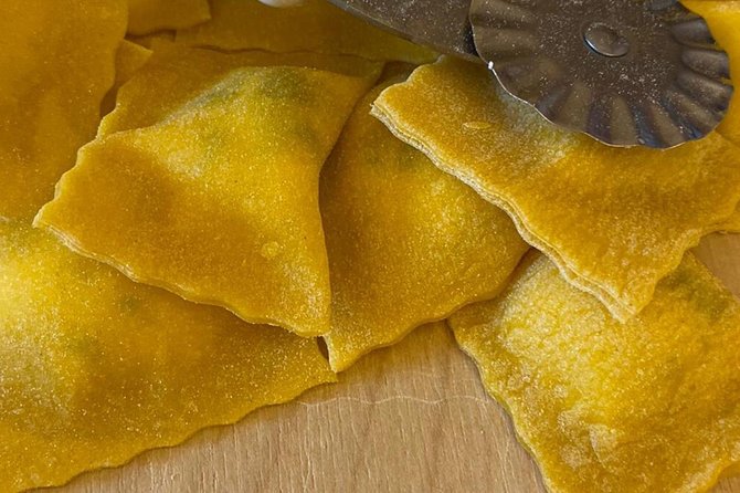 3 in 1 Cooking Class near Navona: Fettuccine, Ravioli & Tiramisu - Drinks and the sit-down meal: wine, water, limoncello, coffee