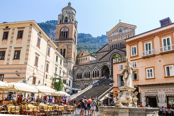 Amalfi Coast & Positano Day Trip from Rome with Coastal Cruise - Positano on your schedule: steep streets, beaches, and shopping lanes