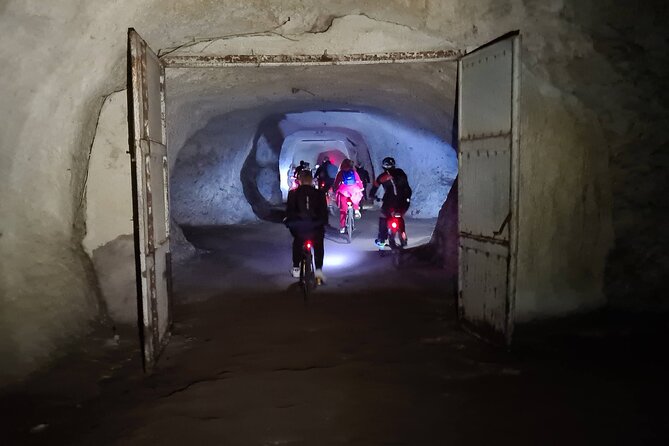 Appian Way Bike tour Underground with Catacombs & Lunch - Ninfeo di Egeria: myth, water, and a pause from stone