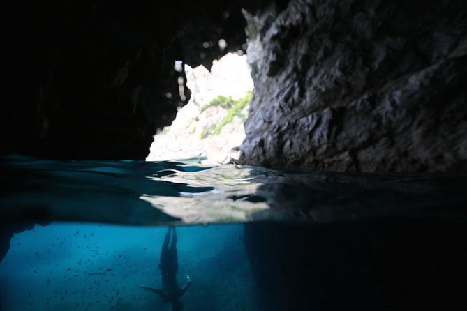 Capri Island Small Group Boat Tour from Rome by Train - Boat route highlights: grottos, arches, and the Faraglioni lineup