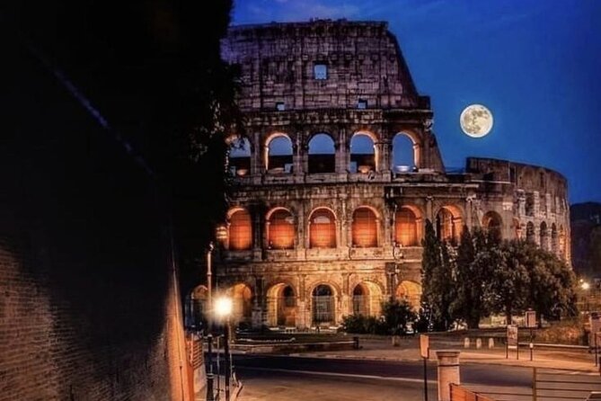 City Golf Cart Tour at Night With Free Pickup - Colosseum at night: your first wow moment, plus a quick explanation