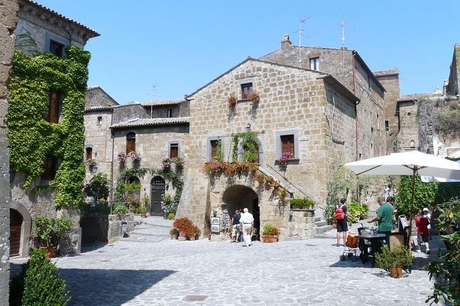 Civita di Bagnoregio and Orvieto - Private Day trip from Rome - Civita di Bagnoregio: the footbridge, the slow streets, and the Etruscan olive oil press