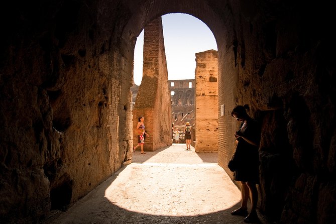 Colosseum Arena Floor, Roman Forum and Palatine Hill Guided Tour - Entering the Colosseum: Arena-Floor Time, Ground-Level Stories, and Headsets