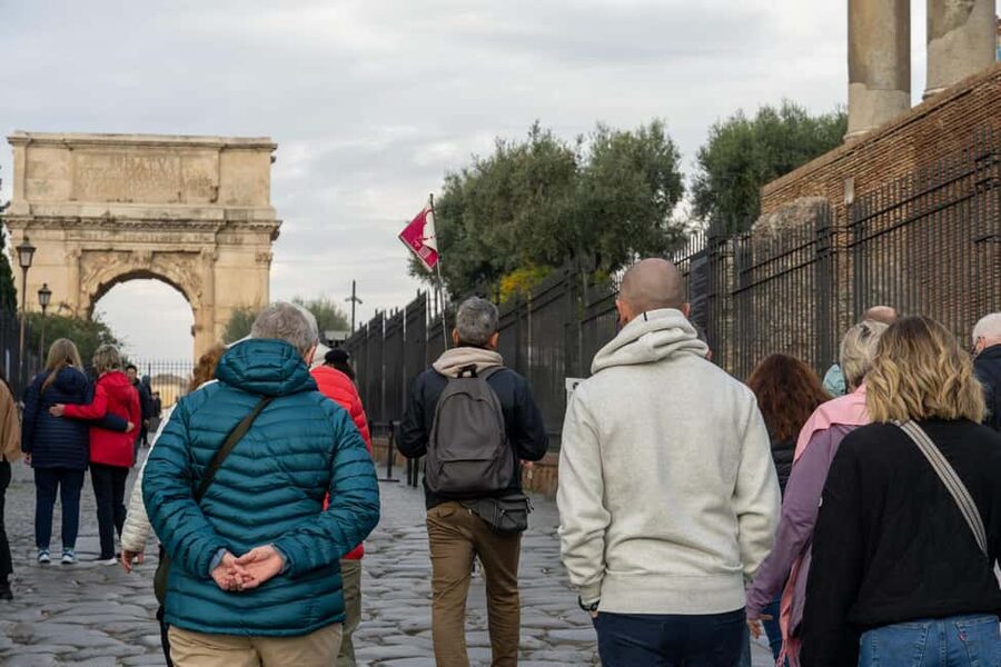 Colosseum Guided Tour: Hotel Transport included - Roman Forum: temples, arches, and politics on foot