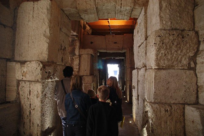 Colosseum restricted areas and Undergrounds Group Tour - Roman Forum stop: Julio Cesar and the feel of ancient city life