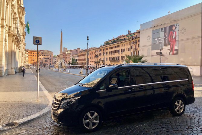 Fiumicino Airport (FCO) to Rome - Private Arrival Transfer - The Mercedes Ride: Air Conditioning, Luggage Help, and Bottled Water