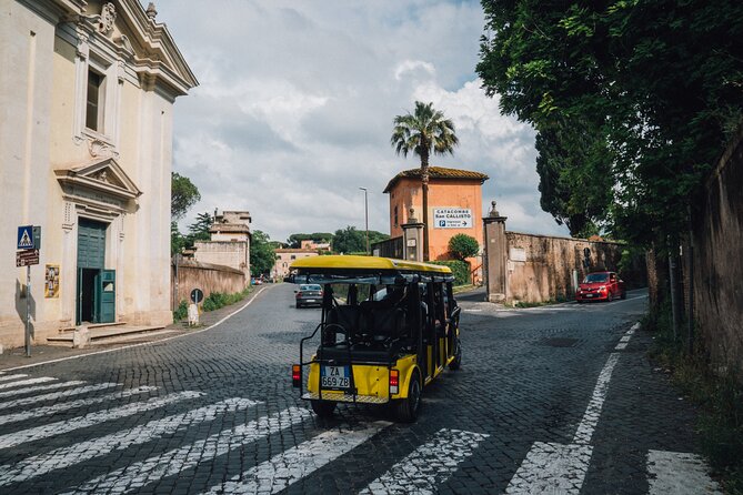 Golf Cart Driving Tour in Rome: 2.5 hrs Catacombs & Appian Way - Exiting old Rome through the St. Sebastian door