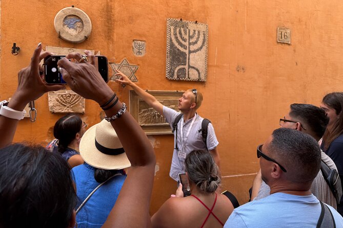 Highlights of Jewish Ghetto And Trastevere Walking Tour - Jewish Ghetto of Rome: papal restrictions and everyday survival