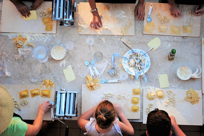 Inspirational Cooking on the Roman Chef's Panoramic Terrace - The shared meal: 2 courses, wine tastings, and a relaxed finish
