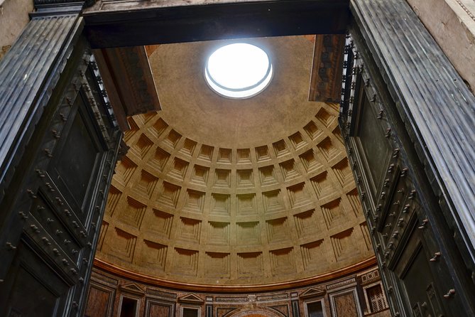Pantheon Private Guided Tour - Rome's Iconic Ancient Temple - Piazza della Rotonda: Jacopo Della Porta’s fountain and a crucifix-capped obelisk