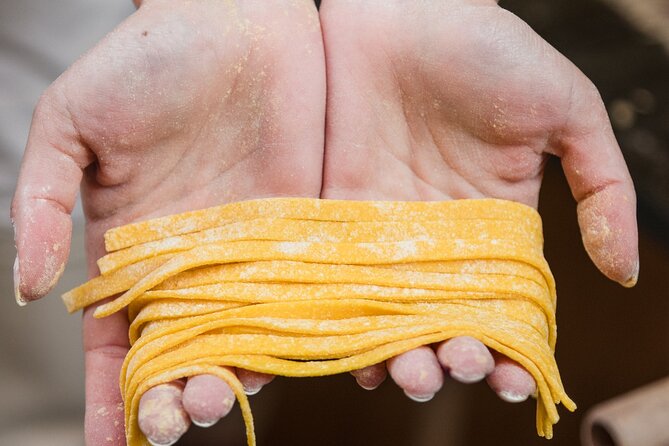Pasta and Tiramisu Making Class at the Trevi Fountain - Step Two: Fresh Tagliatelli on the Pasta Machine