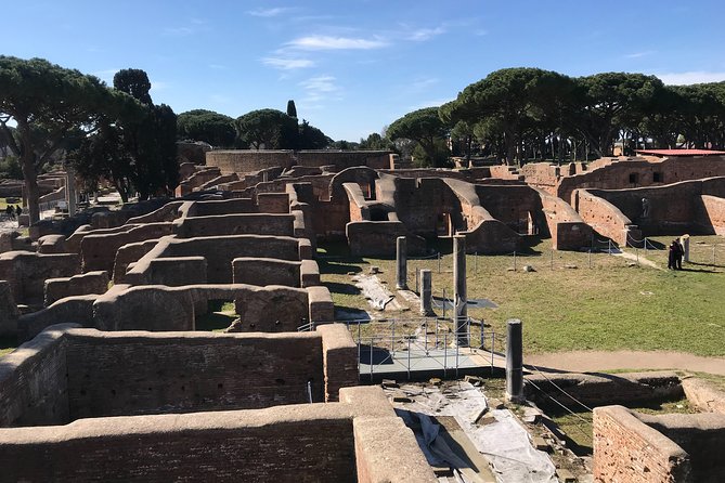 Private tour of Ostia, the ancient city harbor, by van with a PhD archaeologist - Decumanus and the Commercial Heart: Warehouses, Baths, and Meals
