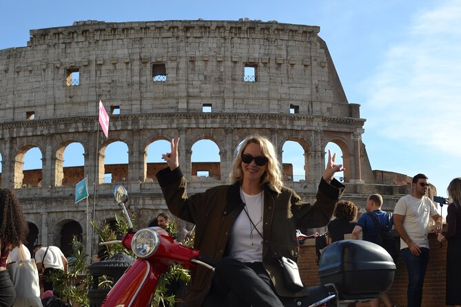 Roma Vespa Tour & Traditional Roman Food and Extras - Passing through old Rome: Trastevere atmosphere and a historic fountain