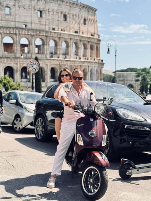 Rome: 1-Hour Vespa Ride as Passenger with a Local Driver - Colosseum pass-by: the fast hit of ancient scale