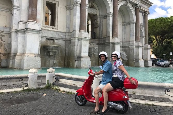 Rome by Vespa Semi Private Tour | MAX 6 PEOPLE GUARANTEED - The Pyramid of Cestius and the Aurelian Walls: Rome’s “how is that here?” stop