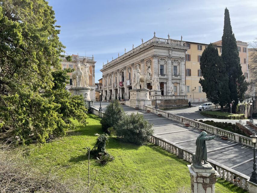 Rome: Capitoline Museums Private Guided Tour - Back downstairs: Marcus Aurelius and the temple ruins setting