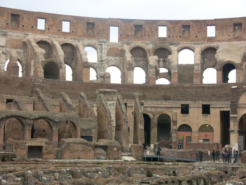 Rome: Colosseum Arena Floor, Roman Forum & Palatine Tour - Arch Stops and Quick Hits: Constantine, Titus, and the Forum Doorway