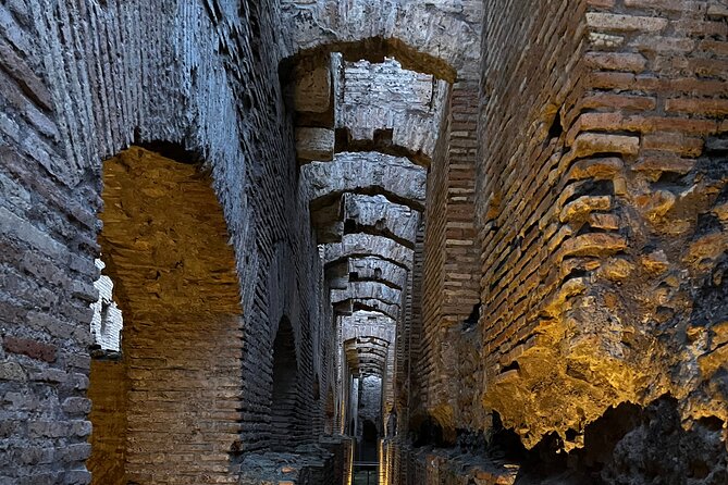 Rome: Colosseum Tour by Night with Arena & Underground - Entering the Colosseum with a guide, not a map