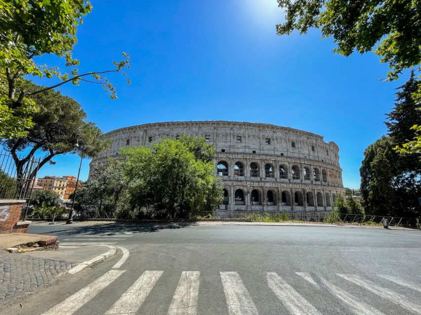 Rome: Colosseum Tour with Access to the Gladiator Arena - Entering through the gladiator gate and the Libitina route