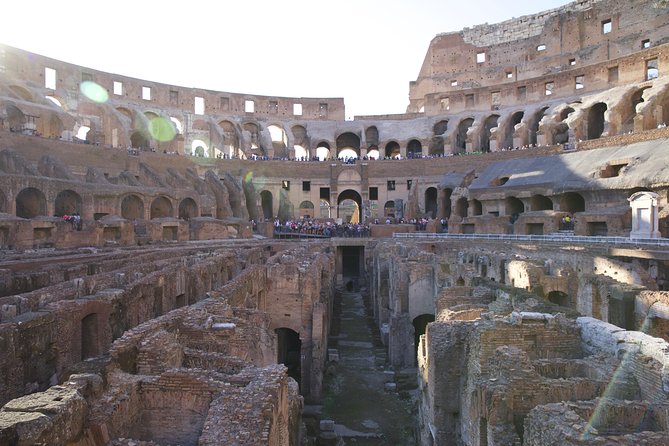 Rome: Colosseum Underground and Roman Forum Guided Tour - Entering the Colosseum: arena views, then down into the dungeons