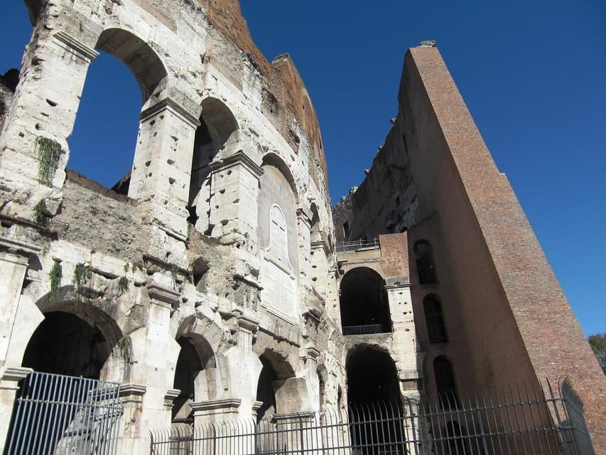 Rome: Colosseum with Access to Arena Floor and Ancient Rome - Palatine Hill: emperor-home vibes, plus signage stress