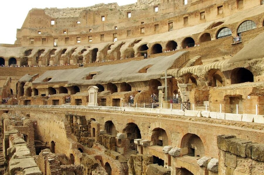 Rome: Explore the Colosseum and Roman Forum, Half-Day Tour - Entering the Colosseum arena: where skip-the-line pays off