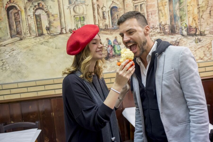 Rome: Food Tour and Wine Tasting in a Traditional Trattoria - Ham and cheese at a historic shop: how Rome sets up flavor