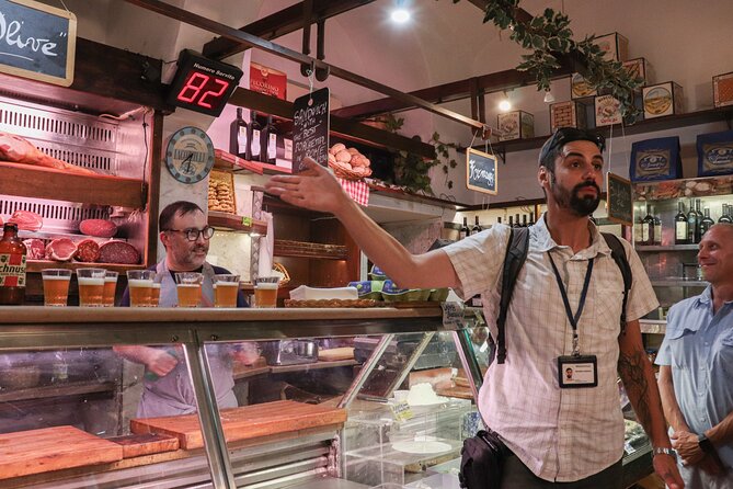 Rome Food Tour & Wine: Trastevere & Campo de' Fiori Like a Local - Piazza Trilussa and suppli al telefono: the fried snack obsession