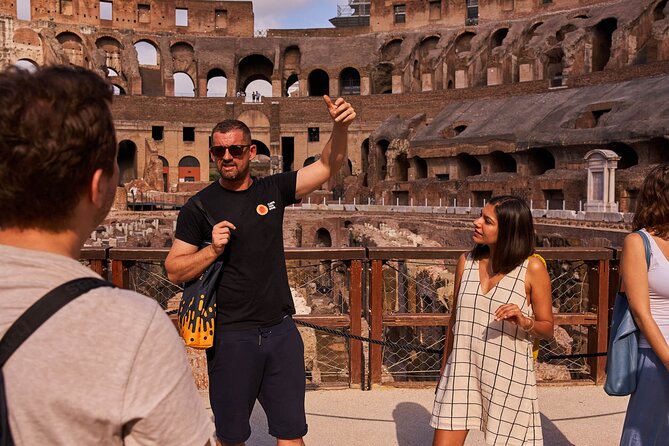 Rome: Guided Tour of Colosseum, Palatine Hill and Roman Forum - Entering the Colosseum: Floors, Gladiators, and Engineering