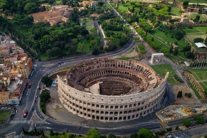 Rome Panoramic Bus Tour & Colosseum Arena Visit with Audio Guide - Entering The Colosseum: Arena Access With Audio Guidance