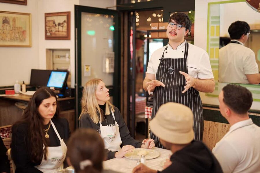 Rome: Pizza Cooking Class in Piazza Navona with Drinks - Toppings, shaping, and the oven moment