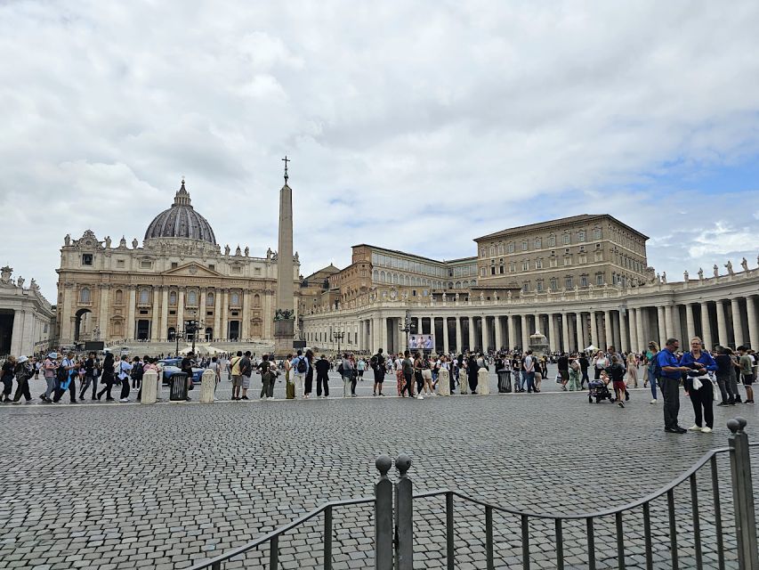 Rome: St. Peter's Basilica, Dome, and Vatican Grottoes Tour - Inside the basilica: marbles underfoot, ceilings in gold, and a guide-led highlight walk