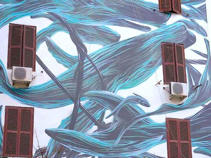 Rome street art tour: off the beaten path with a local guide - Garbatella murals: where neighborhood architecture turns the streets into a show