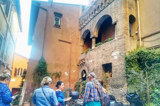 Rome: Trastevere Food Tour Wine Tasting and Local Expert Guide - Stop Two: Tiber Island Sights You’ll Pass Between Savory and Sweet