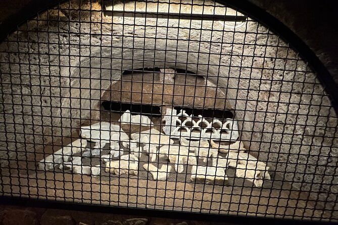 Rome Underground Tour: Catacombs, Crypts & Secrets with Transfers - Vicus Caprarius (the Water City): an underground Roman utility stop near Trevi