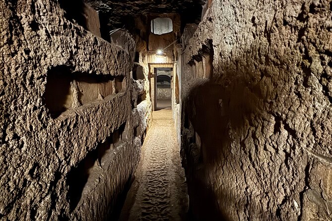 Rome Underground Tour: Catacombs, Crypts & Secrets with Transfers - Catacombe di Domitilla: San Domitilla tunnels and early Christian burial life