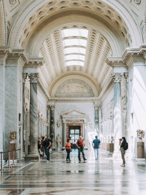 Rome: Vatican Museums Sistine Chapel St Peters Basilica Tour - The Vatican Museums route: sculptures to Raphael Rooms