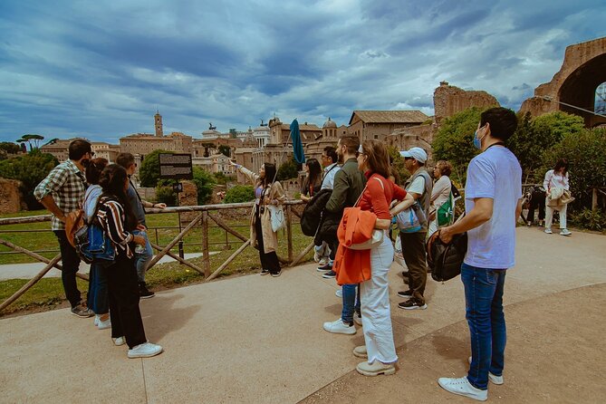 Small group Colosseum with Arena Floor, Palatine Hill & Forum Tour - Roman Forum Centerpieces: Curia, Septimius Severus, Tabularium, Saturn