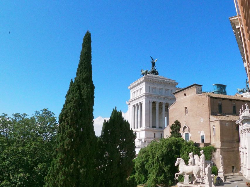 Tour of Colosseum & Roman Forum with Dutch Guide - Roman Forum Walk: Curia, Caesar, and the Via Sacra You Can See