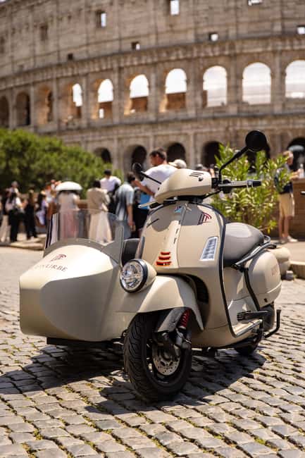 Vespa Sidecar Tour: Highlights of Rome - Piazza Navona: fountains, domed cafes, and Roman stadium bones