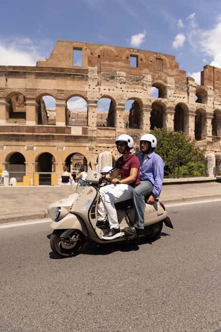 Vespa Sidecar Tour: Highlights of Rome - Colosseum photo stop: the iconic exterior moment, without included tickets