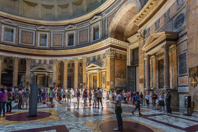 Walking Guided Tour and Rome's Iconic Temple Pantheon Entrance - Entering the Pantheon: Dome, Oculus, and the Two Big Tomb Stops